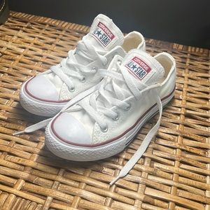 Kids white low top Converse. Size 13. In gently worn condition.